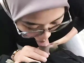 Malaysian honey Awek Tudung takes on her boy's stiff bone in a red-hot rear end-fashion session